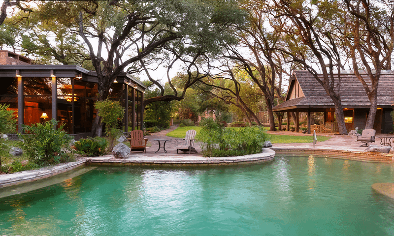 Beautiful backyard with large trees in Castle Hills, TX (1)