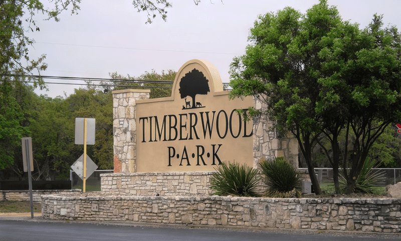 Freshly pruned trees and shrubs in Timberwood Park entrance
