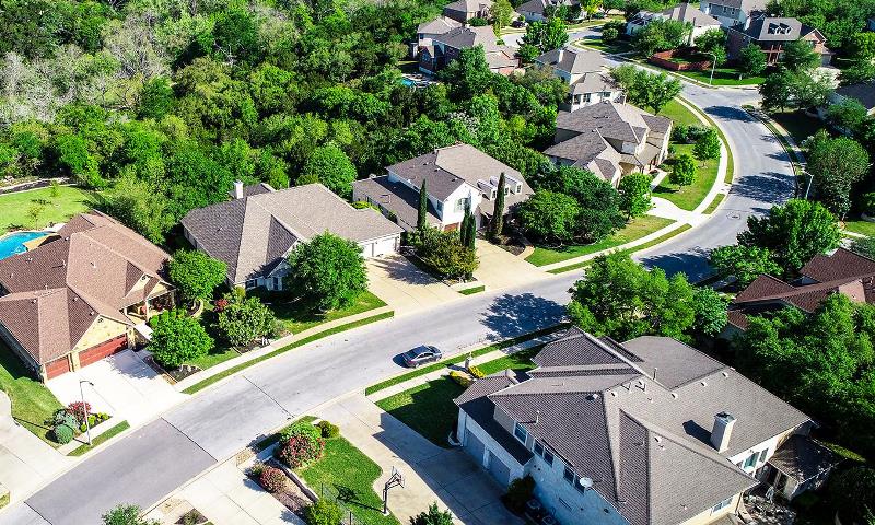 Neighborhood with large trees in Cedar Park, TX (1)