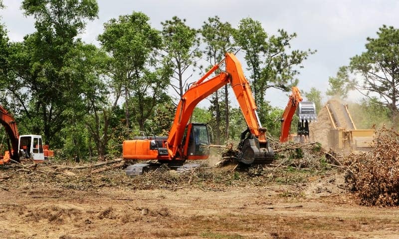 Heavy equipment being used to clear a commercial property