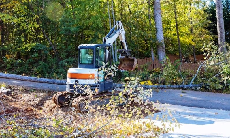 A picture of our heavy equipment helping clean up a damaged area