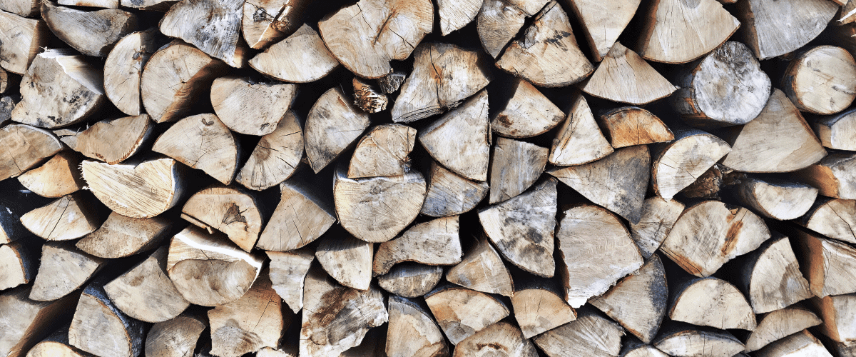 An image of stacked firewood ready to use