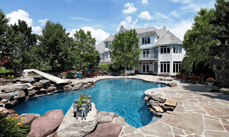 Luxury backyard with well maintained trees in Texas